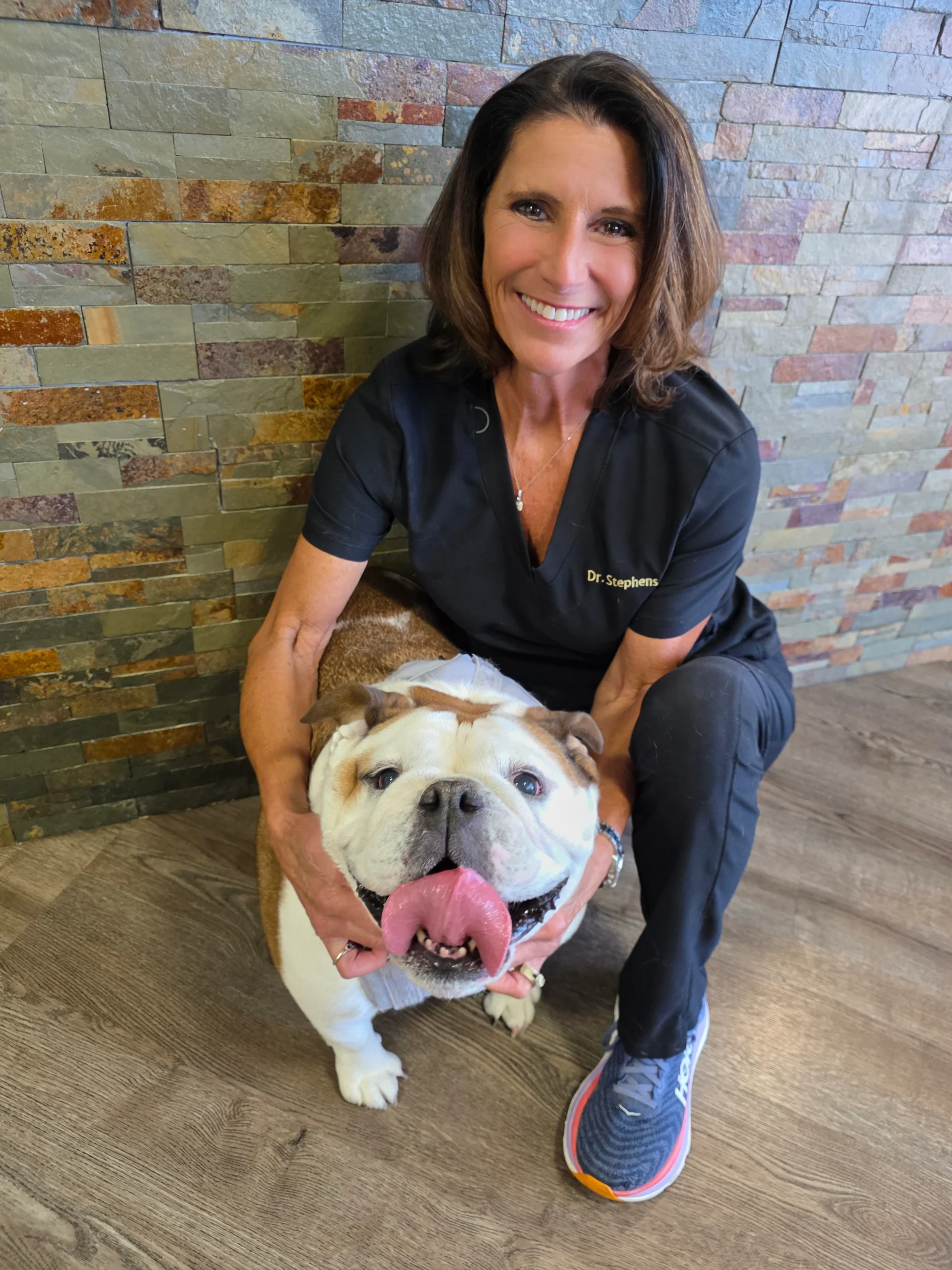 D'Anne R. Stephens, DVM, with an English Bulldog